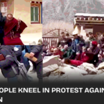 Tibetans kneel in protest against the forced relocation of Yena Monastery for dam construction on the Drichu River, Derge County.
